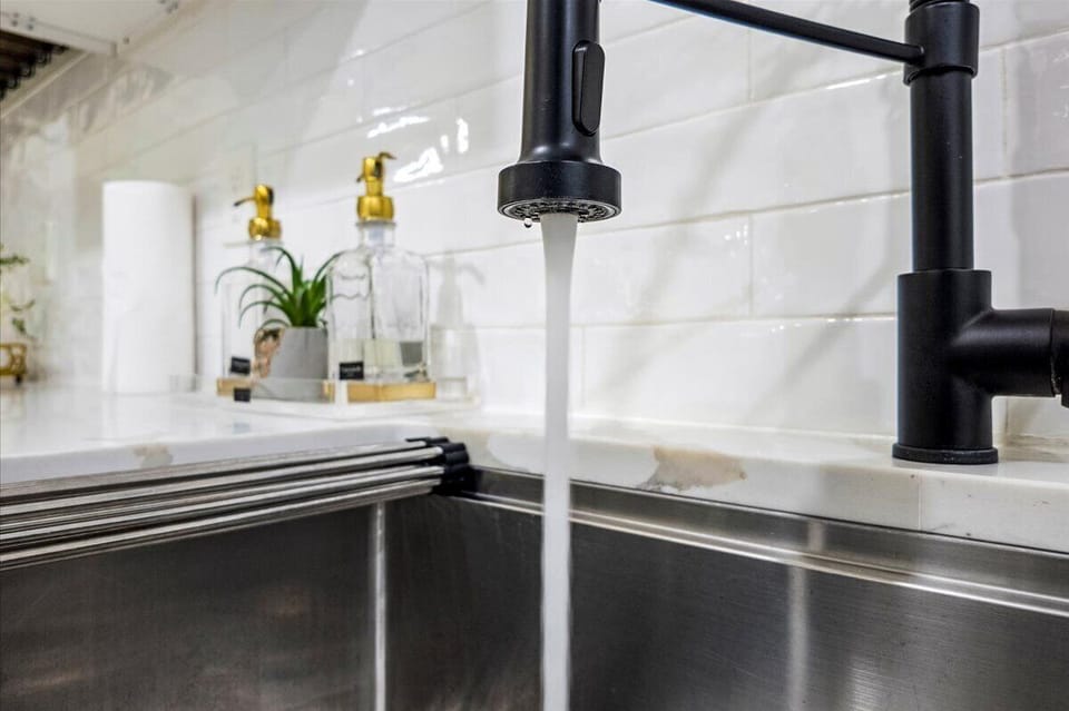 Kitchen Oasis: Modern fixtures and sleek design for culinary adventures!