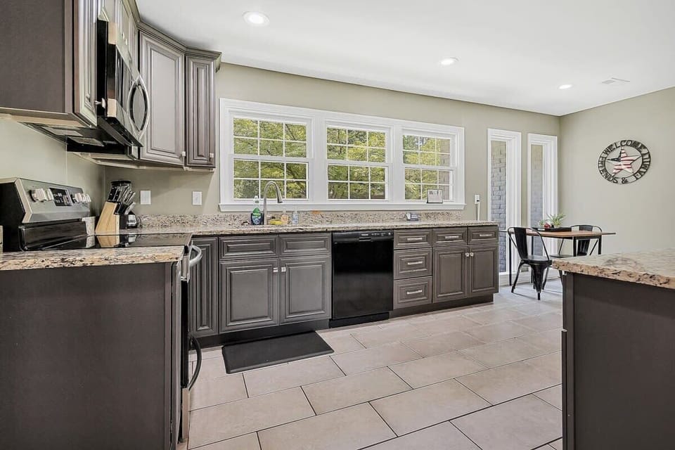 Unit A - Fully equipped space for cooking.