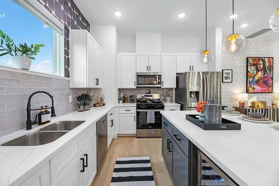 The kitchen boasts all new appliances, including a modern refrigerator, sleek stove, and efficient dishwasher, ensuring a fresh and up-to-date cooking experience.