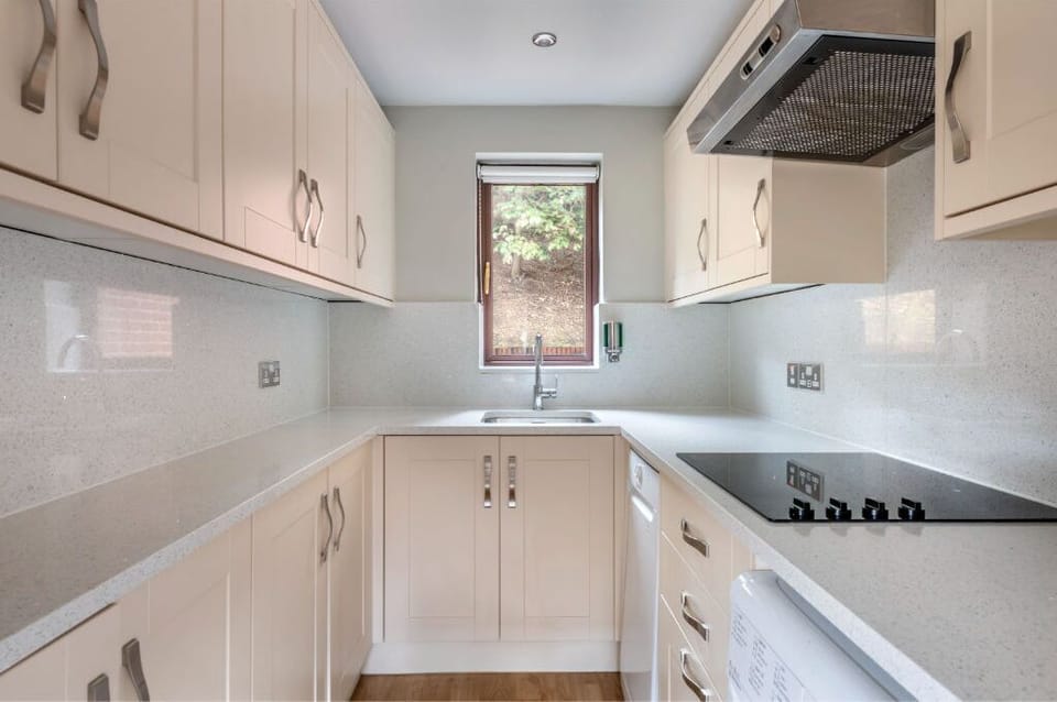 Sleek kitchenette perfect for preparing simple meals and snacks.