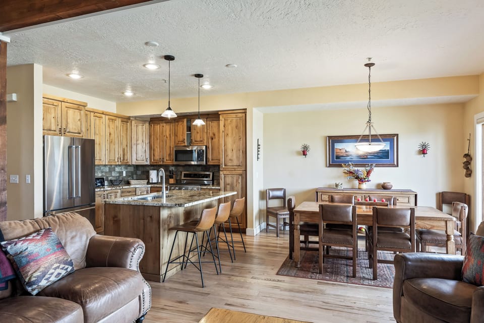 - Granite island and whip up meals in a kitchen that's made for sharing
- Feast and laugh together at the long wooden table, ideal for game nights or hearty dinners
- Lounge in a space that blends comfort, character, and just the right touch of wild