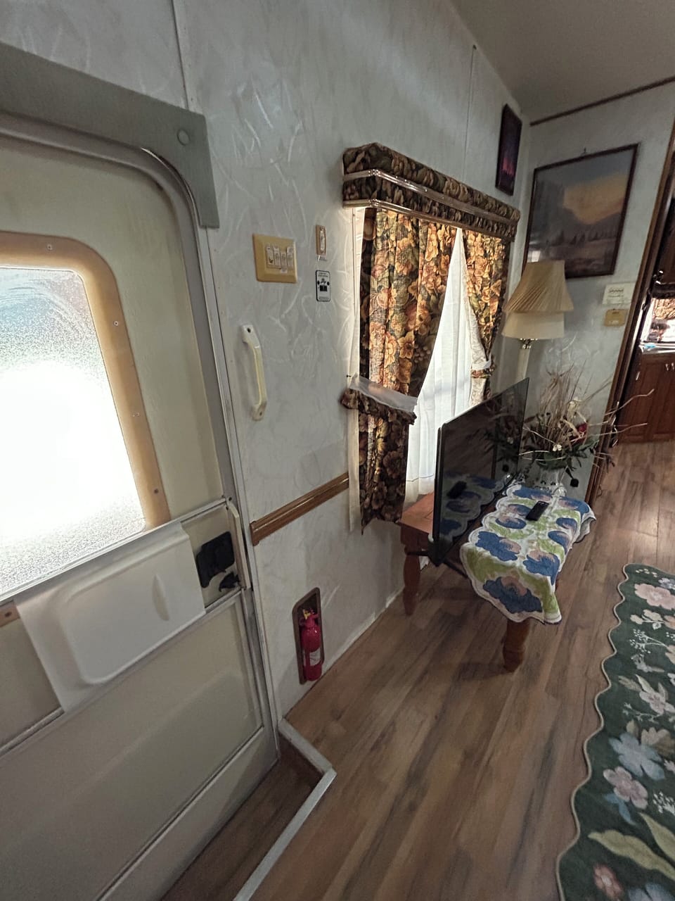 Front Door into Living Room with 40” tv