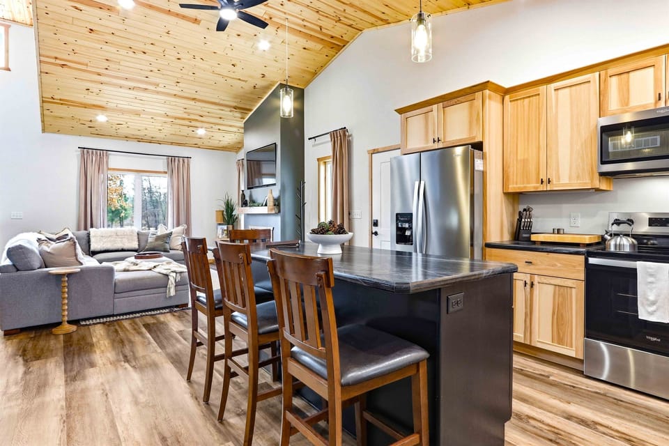 Your bar seating for four at the island means breakfast never has to wait for a table. The kitchen stays open to the living area so nobody misses a conversation.