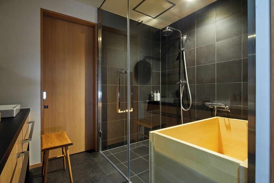 Superior Twin Room, 2 Double Beds | Bathroom | Separate tub and shower, free toiletries, hair dryer, slippers