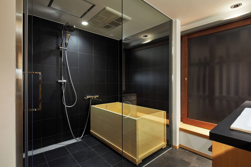 Standard Double Room, 1 Queen Bed | Bathroom | Separate tub and shower, free toiletries, hair dryer, slippers