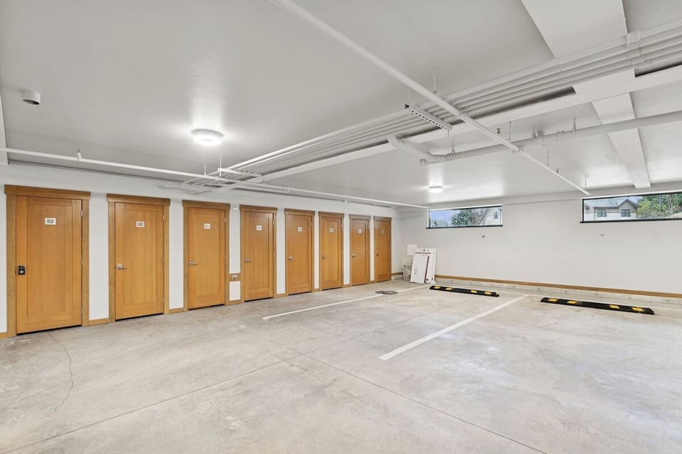 Storage locker 302 in parking garage