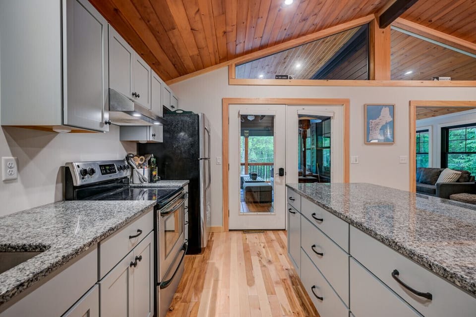 Stocked kitchen with modern appliances, perfect for cooking up a delicious homemade meal.