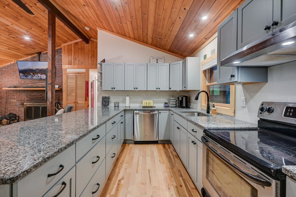 Stocked kitchen with modern appliances, perfect for cooking up a delicious homemade meal.