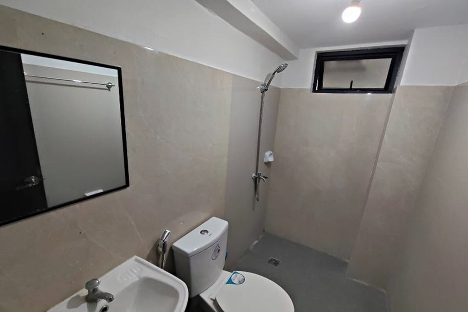 Family Room | Bathroom | Shower, rainfall showerhead, slippers, towels