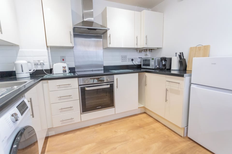 Apartment | Private kitchen | Full-size fridge, microwave, oven, stovetop