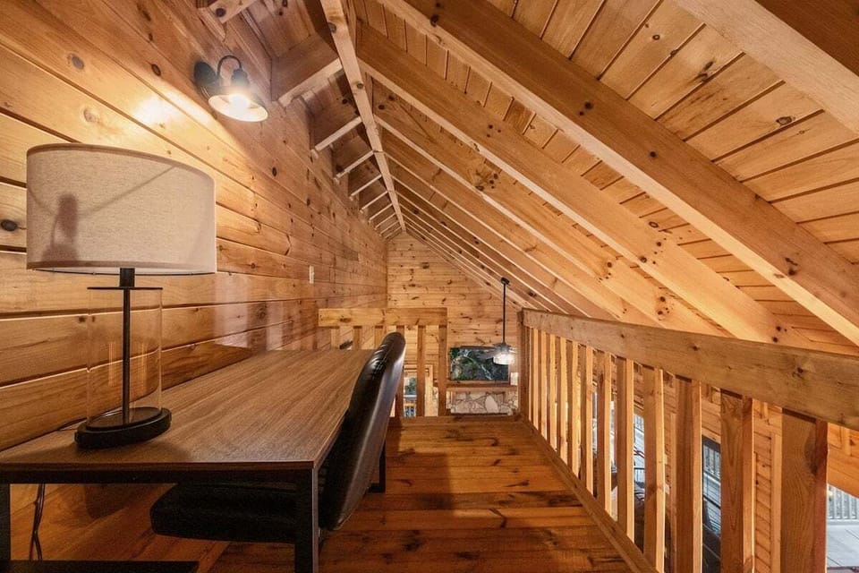 Loft space accessible by ladder with workspace