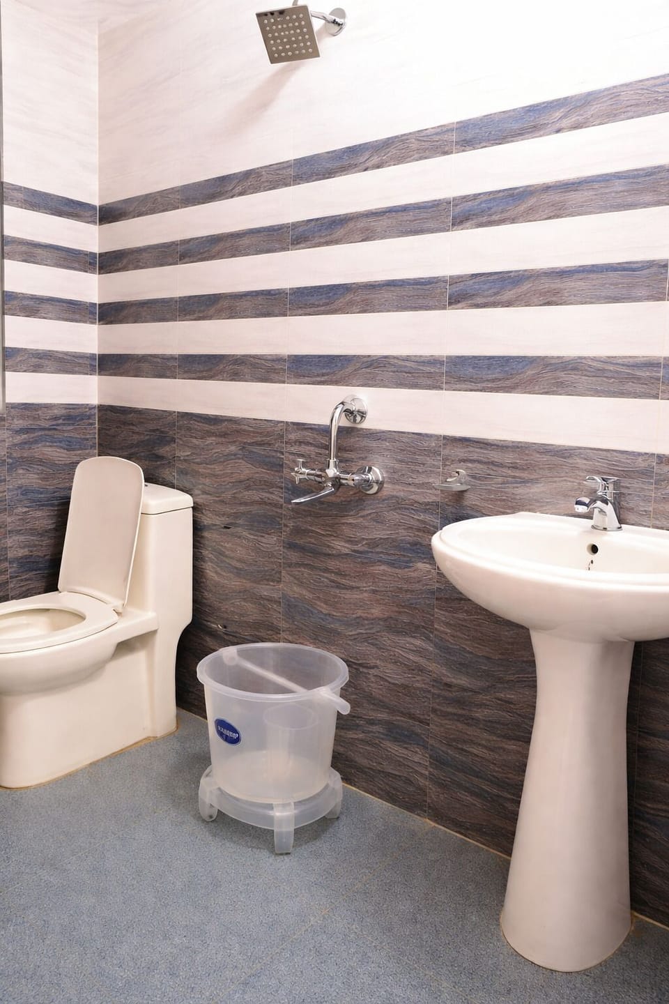 Shower, rainfall showerhead, designer toiletries, slippers