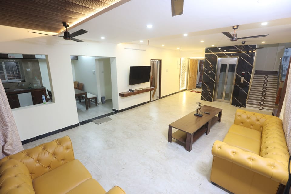 Luxury Apartment, Beach View | Living area | 32-inch LED TV with digital channels