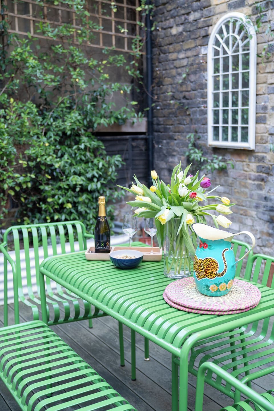 With a beautifully set table, lush greenery, and a serene atmosphere, this is the ideal spot to unwind and make lasting memories.