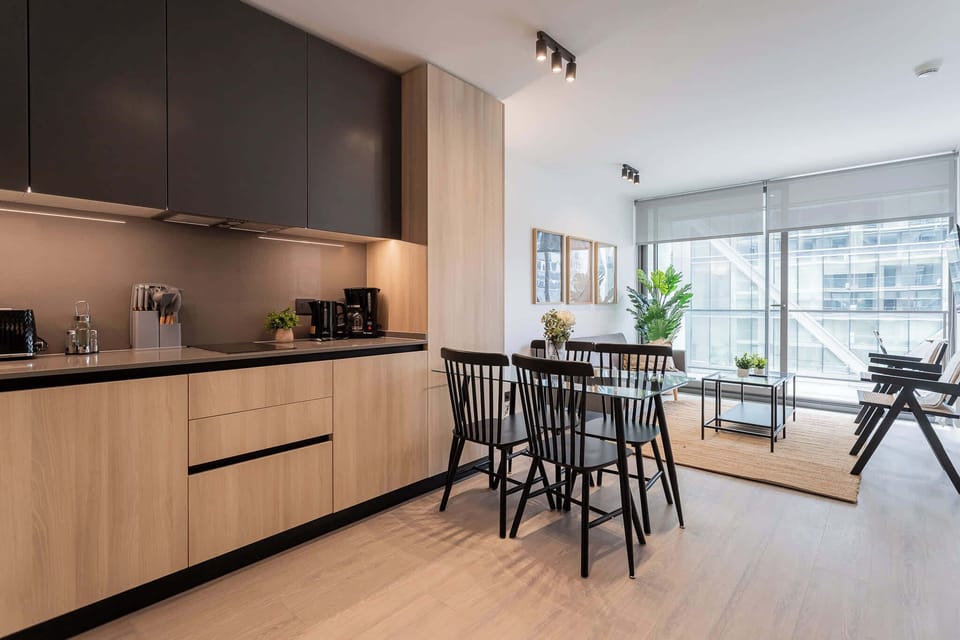 Experience modern living in this stylish kitchen with sleek cabinetry and abundant natural light, perfect for your culinary adventures.