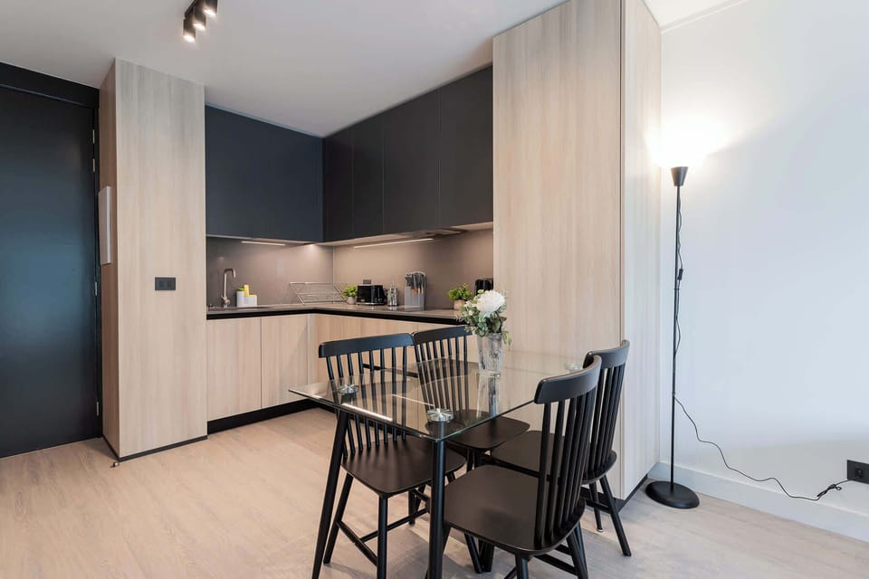 Experience modern living in this sleek kitchen, perfect for cooking and dining with friends or family.