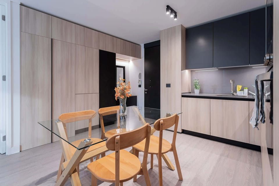 Experience modern living in this stylish kitchen, perfect for family meals or a cozy breakfast. Enjoy the sleek design and warm ambiance!