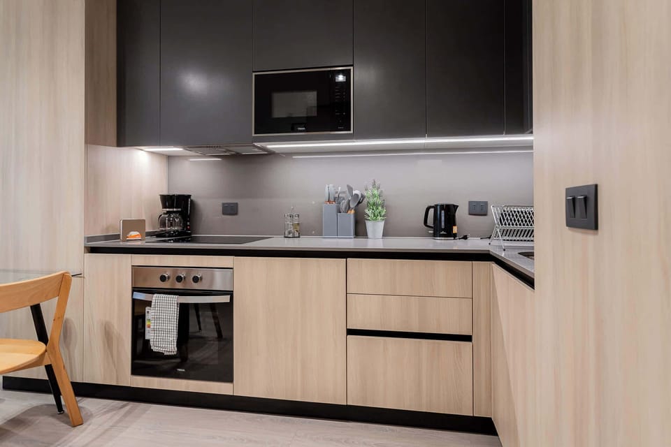 Sleek and modern kitchen with all essentials for a comfortable stay.