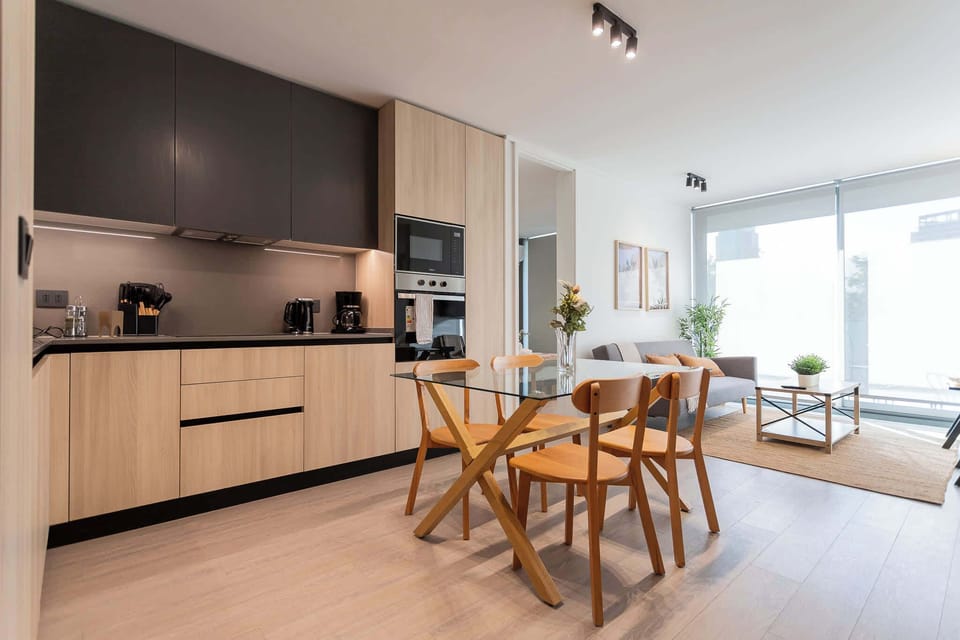 Experience modern living in this stylish kitchen and dining area, perfect for family meals and gatherings. Bright, airy, and equipped for your culinary adventures!
