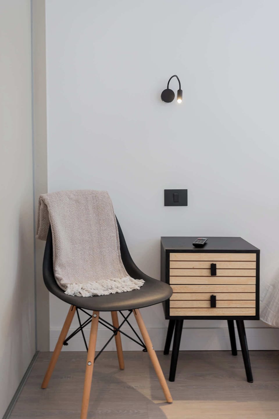 Cozy and modern bedroom corner with stylish decor, perfect for unwinding after a day of exploring Chile.