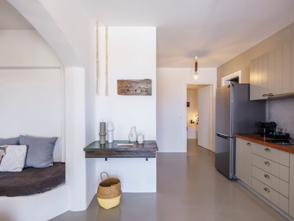 Deluxe Suite, 2 Bedrooms, Housekeeping, Beach View | Private kitchen | Coffee/tea maker, highchair
