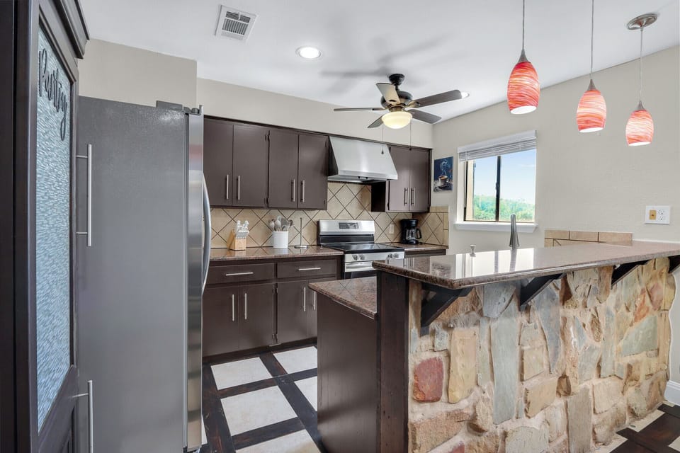 Custom stone work on the kitchen bar top