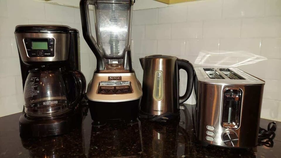 The kitchen offers small appliances to make your stay even better. 