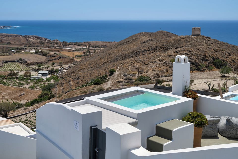 Panoramic Caldera Views from the Terrace
Iconic volcanic scenery visible from your private lounging area.
