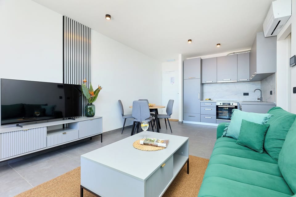 Apartment (1 Bedroom) | Living room | 123-cm Smart TV with cable channels