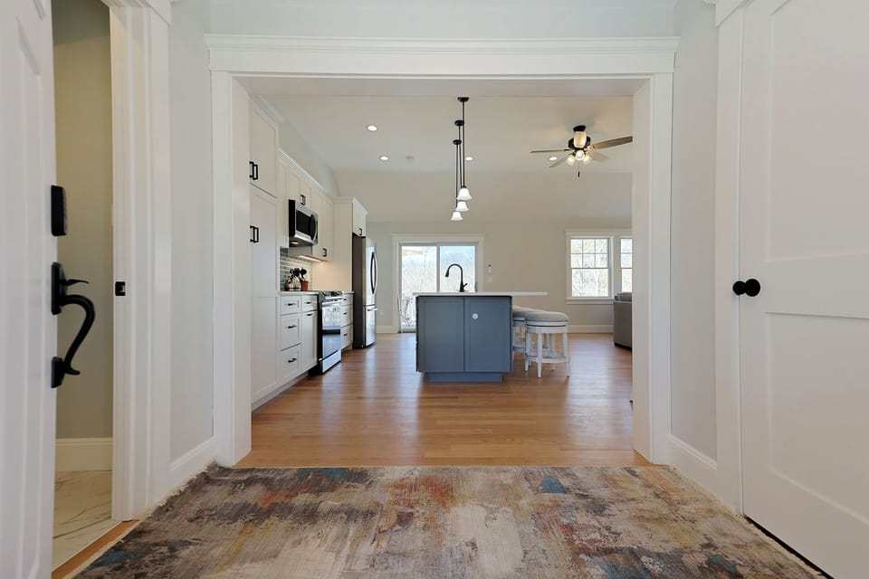 Entryway View into Kitchen & Living Area.