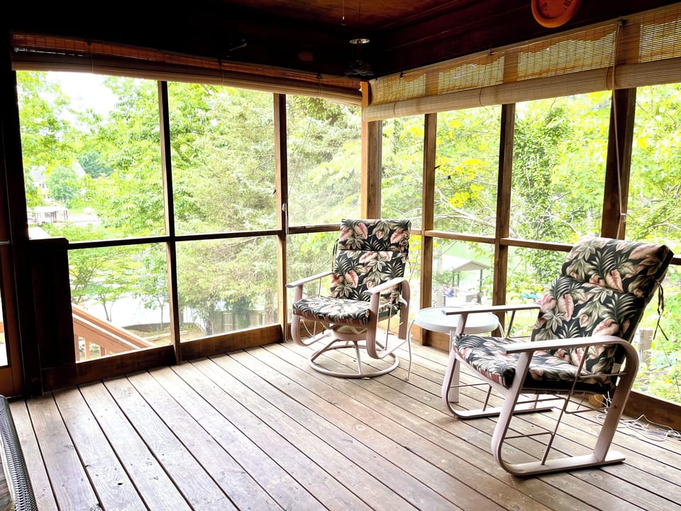Porch offers shades to provide privacy from neighboring home or shade