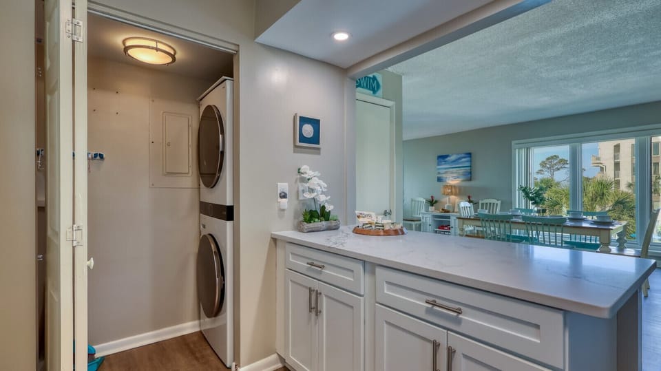 Full-Size Washer & Dryer Tucked Conveniently in the Kitchen