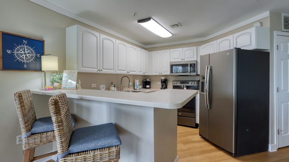 Kitchen + Breakfast Bar: Sip, Savor, Start Your Day
