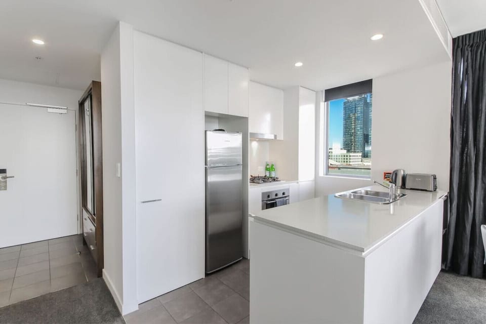 kitchen with dishwasher,fridge,oven