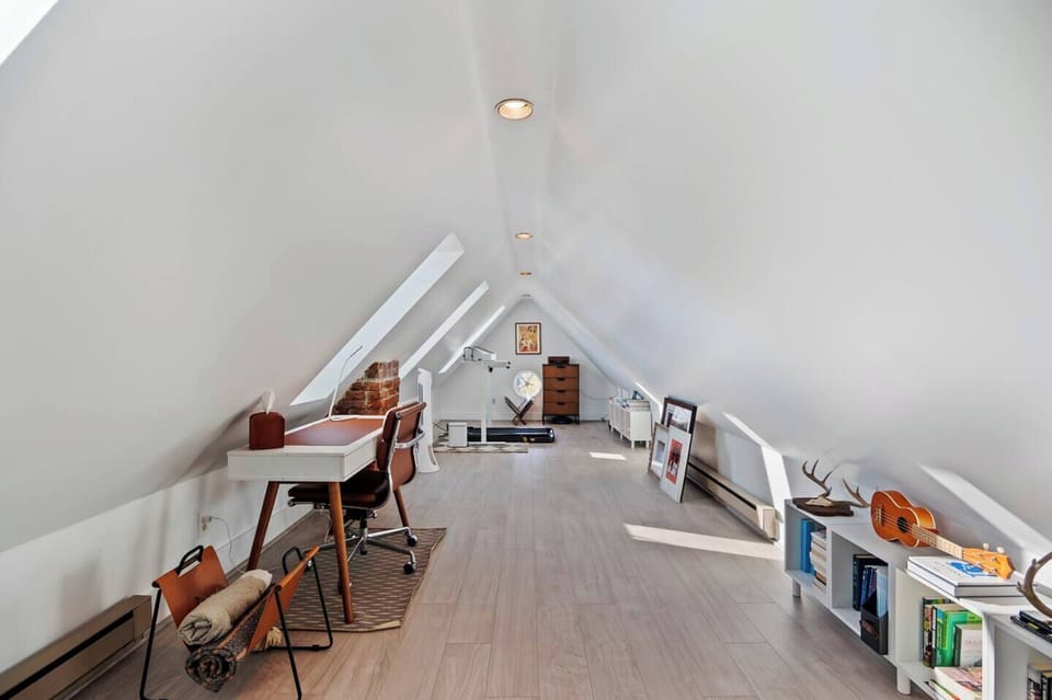 The loft area is perfect for getting work done and exercising on the treadmill. 