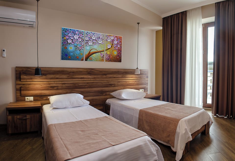 Basic Twin Room, Balcony, Sea View | WiFi (free), bed sheets