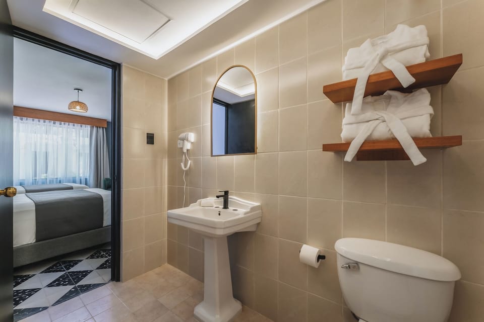 Superior Double Room, 2 Double Beds, City View | Bathroom | Shower, hair dryer, towels, soap