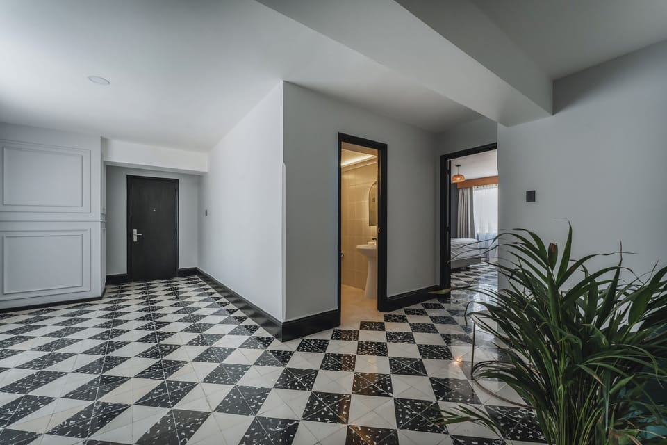 Luxury Suite, 1 King Bed, City View | Living area | 56-inch Smart TV with cable channels