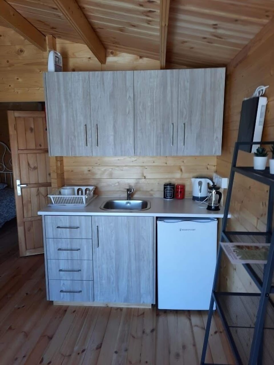 Mini-fridge, microwave, stovetop, electric kettle
