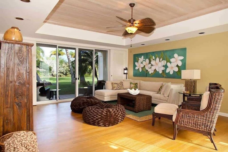 Kick back in this stylish lounge with natural textures, garden views, and plenty of sunshine.