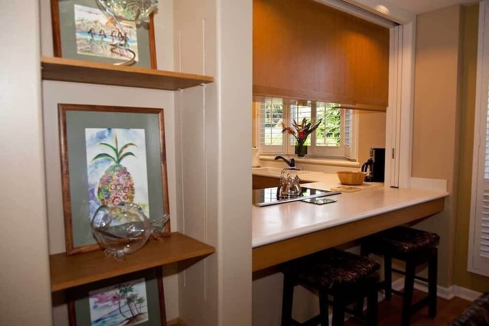 Slide up to this cozy breakfast bar and sip your morning coffee with a garden glow.