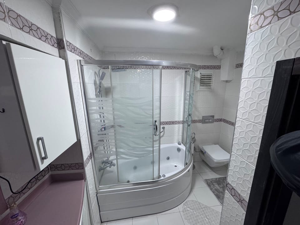 Comfort Room, Sea View | Bathroom | Hair dryer, towels, soap, shampoo