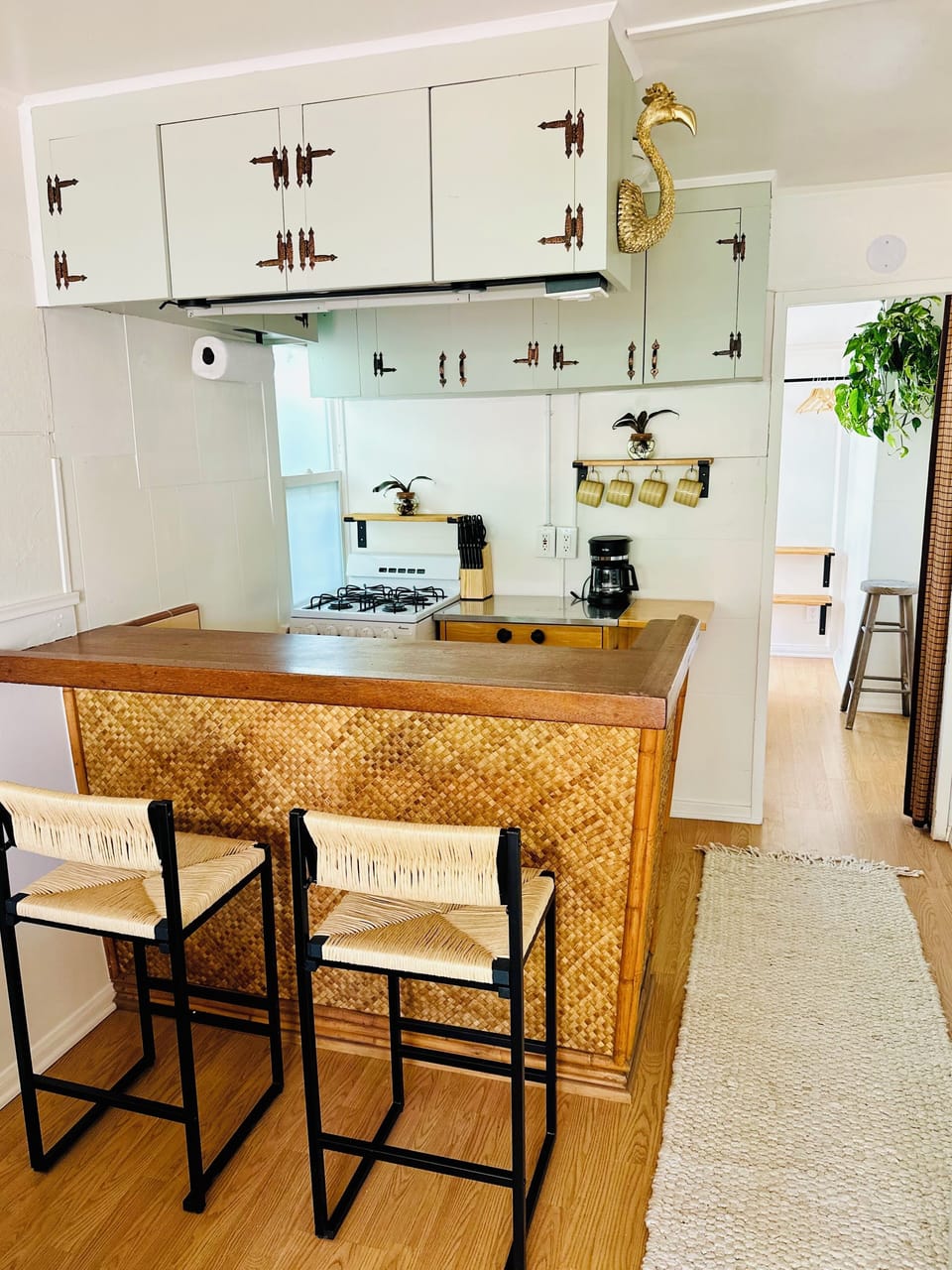Bar dining, with a fully-equipped kitchen.