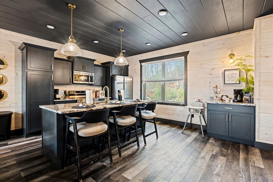 Prepare meals in style in our spacious kitchen, complete with stunning mountain views.