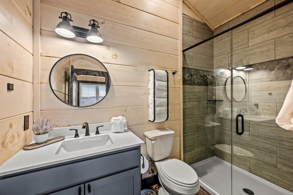 Enjoy the privacy of an ensuite on the upper floor, complete with stunning mountain views for a peaceful retreat.