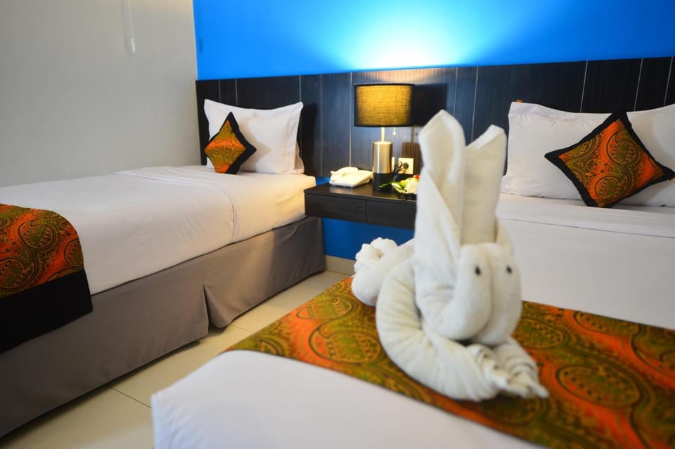 In-room safe, desk, laptop workspace, rollaway beds