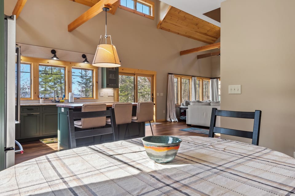 Dining table and island seating for three