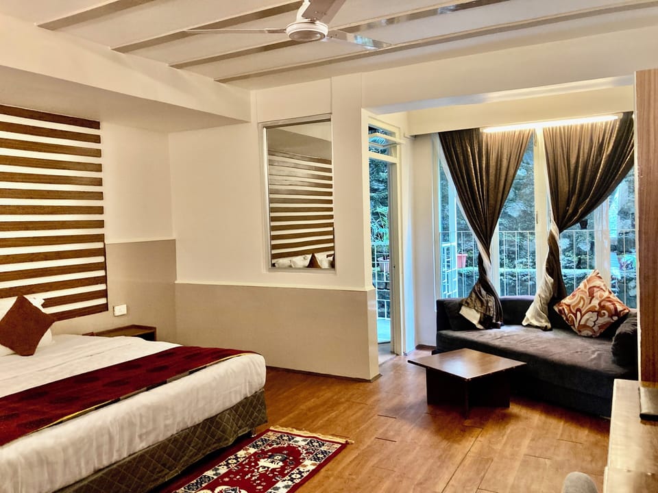 Premium bedding, down comforters, desk, laptop workspace