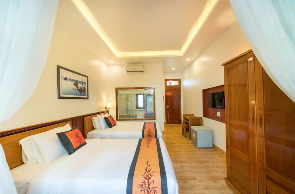 Superior Twin Room, Garden View | Down comforters, minibar, desk, soundproofing