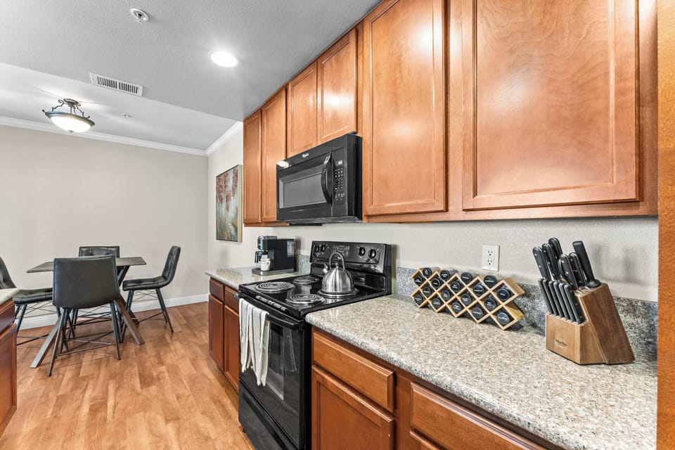 Everything you need to cook and dine comfortably — full-size appliances, cookware, and a modern layout.